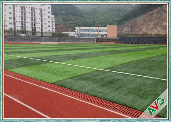 CHINA Césped artificial del mantenimiento del SGS de la hierba fácil del fútbol con PP + forro neto proveedor