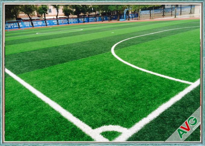 Césped sintético 13000 Dtex del fútbol del ISO 14001 para el campo de fútbol profesional 0