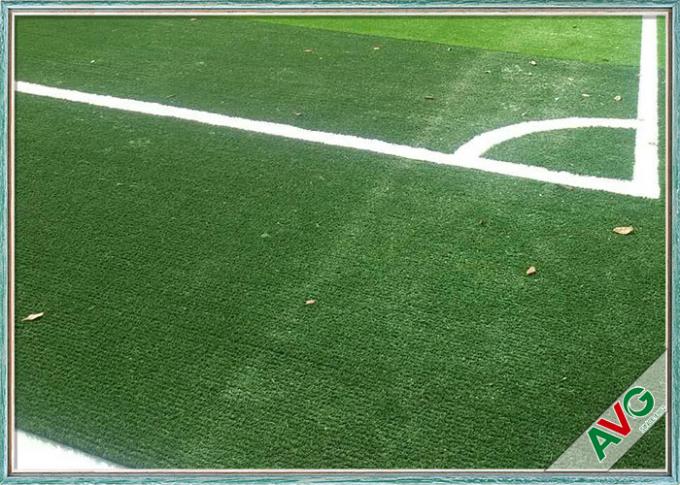 Hierba durable falsa del sintético del fútbol del color verde de Dtex del hilado del césped 13000 del fútbol 0