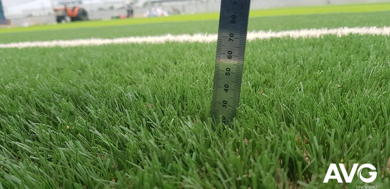 CHINA Césped sintético lleno de la hierba 60m m artificial de alta densidad para el fútbol proveedor