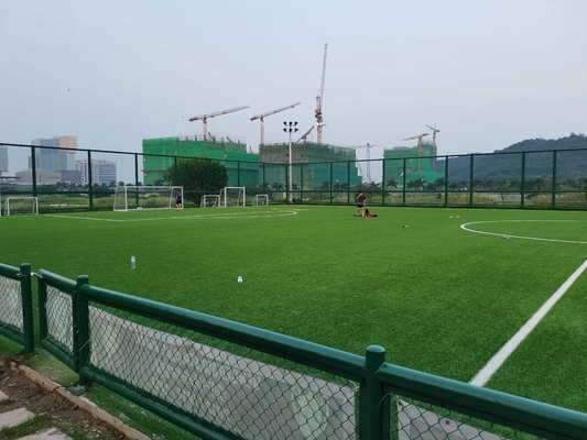 CHINA Hierba artificial y deportes del fútbol que suelan para el precio del campo de fútbol para la venta al por mayor proveedor