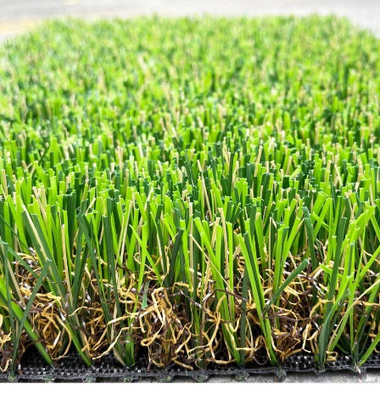 CHINA Paño artificial de los PP del verde del campo de hierba del jardín rizado del PPE más red reforzada proveedor