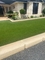 El piso falso verde al aire libre de la hierba alfombra el césped artificial sintético para el jardín proveedor
